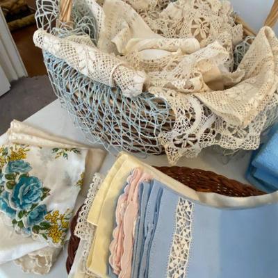 large assortment of antique doilies