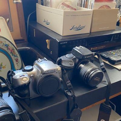 several canon 35m cameras