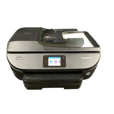 ANDE700 HP ENVY Photo 7855	Home photo printer with additional high resolution photo paper included as shown.
