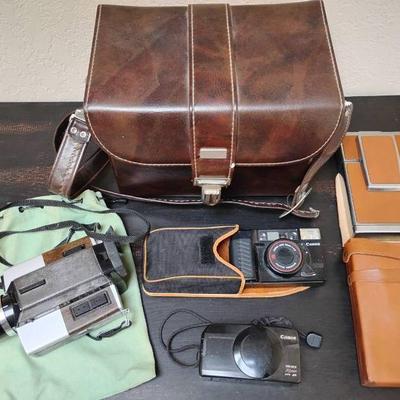 Mb169 canon and polaroid film and video cameras