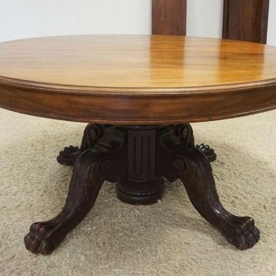1155	ANTIQUE MAHOGANY 59 IN ROUND EXTENSION PEDESTAL TABLE W/MASSIVE CARVED CLAW FOOT BASE & 5 13 3/4 IN LEAVES, APPROXIMATELY 59 IN...