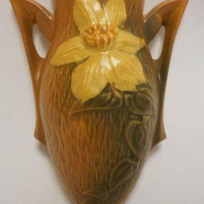 1002	ROSEVILLE POTTERY WALL POCKET, BROWN CLEMATIS, APPROXIMATELY 8 1/2 IN HIGH
