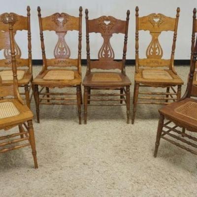 1146	7 OAK CHAIRS W/CANE SEATS, CARVED & PIERCED BACKS
