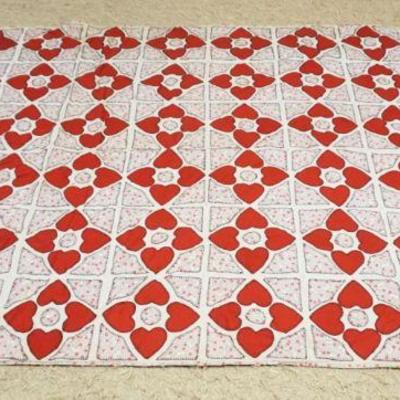 1067	ANTIQUE HAND STITCHED QUILT W/HEART PATTERN, APPROXIMATELY 68 IN X 90 IN, SOME STAINING
