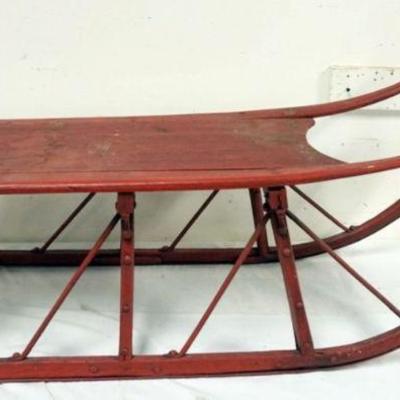 1063	PRIMITIVE WOOD CHILDS SLEIGH, APPROXIMATELY 43 IN X 15 IN X 23 IN HIGH
