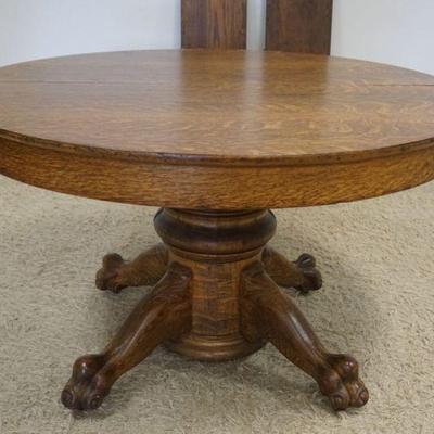 1145	ROUND OAK CLAW FOOT TABLE W/2 LEAVES, APPROXIMATELY 48 IN X 29 IN HIGH, LEAVES APPROXIMATELY 12 IN
