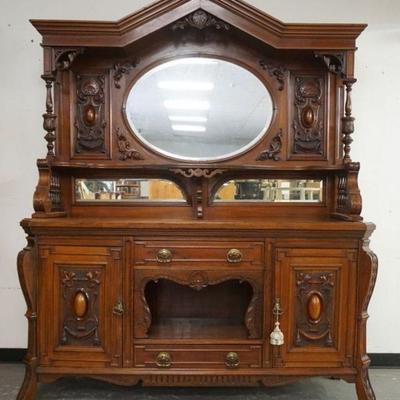 1132	VICTORIAN HEAVY CARVED WALNUT 2 PART SIDEBOARD W/ TURNED COLUMNS & BEVELED MIRRORS, APPROXIMATELY 73 IN X 23 IN X 93 IN HIGH
