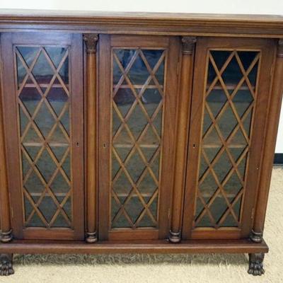 1125	DIMINUTIVE EMPIRE STYLE WALNUT BOOKCASE, 3 DOOR W/CORINTHIAN HALF COLUMNS, LATTICE GRILL DOOR FRONTS & CLAW FEET, APPROXIMATELY...