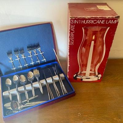 https://ctbids.com/estate-sale/33787/item/3789276/Vintage-Floral-Silverware-Set-Glass-Hurricane-Candle-Lamp