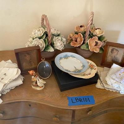 https://ctbids.com/estate-sale/33787/item/3775927/Vintage-Hats-And-Figurines