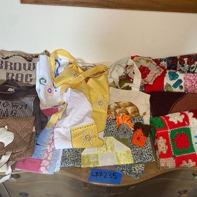 https://ctbids.com/estate-sale/33787/item/3793160/Vintage-Linens-Mystery-Lot