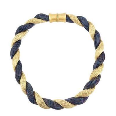 Lot 035   
Valerie Peyton Horn Twisted Silk Strand Necklace