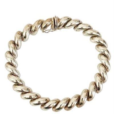 Lot 058   
Sterling Silver Rope Style Bangle Bracelet