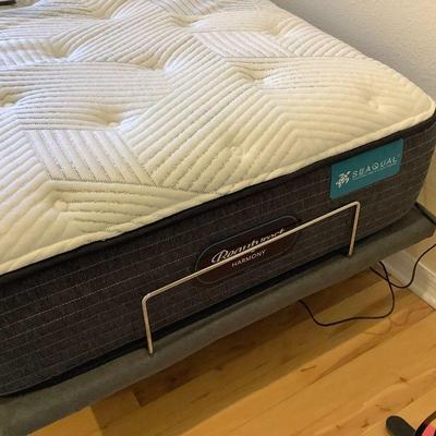 Adjustable bed with like new mattress