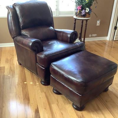 Leather reclining back chair with ottoman