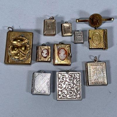 (10pc) MINIATURE BOOK LOCKETS | Miniature book-form lockets with picture frames inside. - w. 1.25 x l. 1.5 in

Contact All Country Estate...
