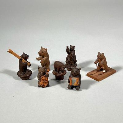 (7pc) MINIATURE WOOD BEARS | Carved wood miniature bear figures including: bears playing accordion & upright bass, skiing bears, and...