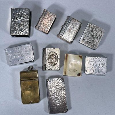 (9pc) Miniature Book Stamp boxes & Snuff Boxes | Mixed lot of souvenir stamp book boxes, tooled snuff boxes, and silver plate...