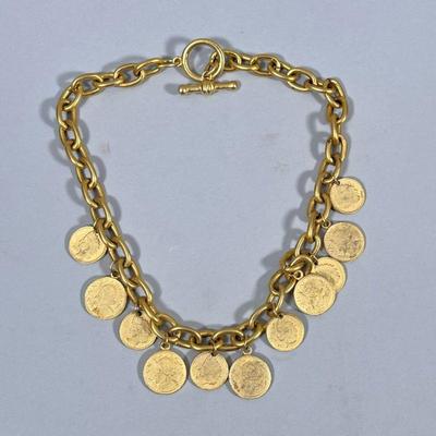 BRASS COIN NECKLACE | Mixed metal necklace with 11 alternating mixed metal antique-style coin pendants. - l. 19 in

Contact All Country...