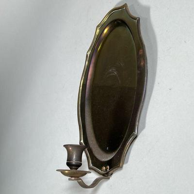 BRASS WALL SCONCE | Single arm candlestick holder wall sconce, marked "Made in India" on back. - h. 12.25 x w. 8 in

Contact...