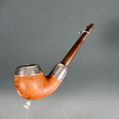 FD STERLING MOUNTED PIPE | A Fire Department commemorative tobacco pipe with a sterling silver mounted burlwood bowl, with inscription,...