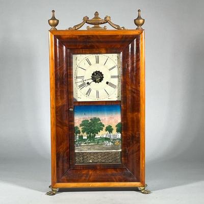 BURLWOOD SHELF CLOCK | Contrasting burlwood case with mounted brass feet, the face with Roman numeral markers and floral decoration, with...