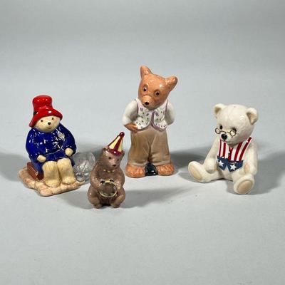 (4pc) CERAMIC TEDDY BEARS | Including: Beswick Ware “Paddington at the Station” figurine, Lenox “Teddy’s 100th Anniversary” figurine, and...