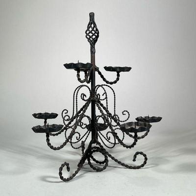 WROUGHT IRON CANDELABRA | Scrolled and twisted metalwork votive candle holder. - h. 13.5 x dia. 12 in

Contact All Country Estate Sales
