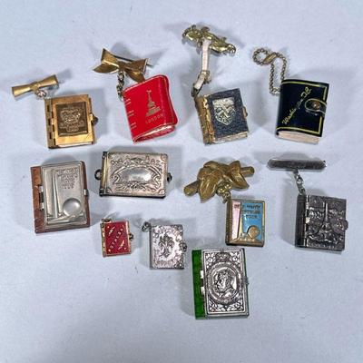 (11pc) MINIATURE SOUVENIR PICTURE BOOKLETS | Miniature book-form souvenir picture books from France, London, New York, Washington D.C.,...