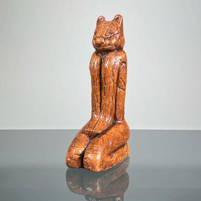 CALUSA CAT FIGURE | Sculpted ceramic seated cat figure after the carved wood Key Marco Cat by the Calusa Indians. - h. 6.5 in

Contact...
