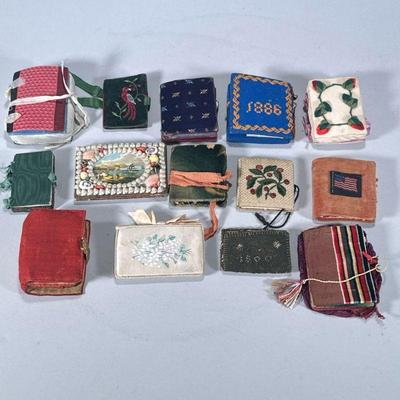 (14pc) ANTIQUE PINCUSHIONS AND NEEDLE CASES | Mixed lot of antique pin cushions and needle cases. - h. 1 x w. 2.75 x l. 3.75 in

Contact...