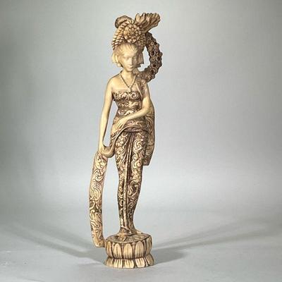 CARVED ASIAN STATUE | Resin, faux bone, figure of a woman in flower carved robe with large hairpiece - h. 27.25 x w. 8 x d. 4.5 in...