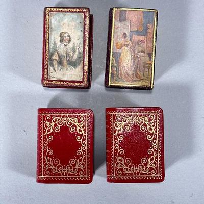(4pc) TOOLED LEATHER MATCHBOXES & OTHER | Including: pair of tooled leather & gilt book matchboxes and a pair of painted and gilt...
