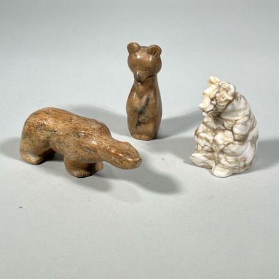 (3pc) CARVED STONE BEAR FIGURINES | 3 bear figurines carved from various stones. - h. 2 x w. 1.5 x l. 6 in

Contact All Country Estate...