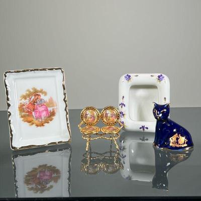 (4pc) LIMOGES & OTHER PORCELAIN | Including a Limoges France transferware porcelain frame with courting scene, a Limoges settee with...