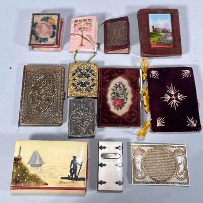 (12pc) MIXED NEEDLEBOOKS & PINCUSHIONS | Mixed lot of brass & mixed metal, carved bone, and other needle books & pin...