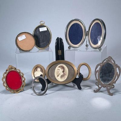 (7pc) OVAL PICTURE FRAMES | Mixed lot of brass & mixed metal oval & circular picture frames & one mirror. - h. 4 x w. 9.75...