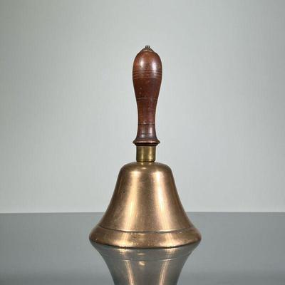 ANTIQUE BRASS SCHOOL BELL | A brass bell with wooden handle. - h. 6.5 x dia. 3.75 in

Contact All Country Estate Sales
