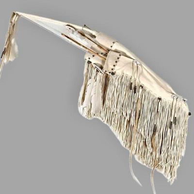 White deerskin wrapped bow, white deerskin quivers with 2 obsidian tipped ends, deer antler, horsehair and metal adornments.