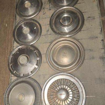 #4082 • (8) Metal Hubcaps
