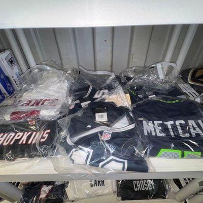 #7570 • NEW!!! (9) Football Jerseys
