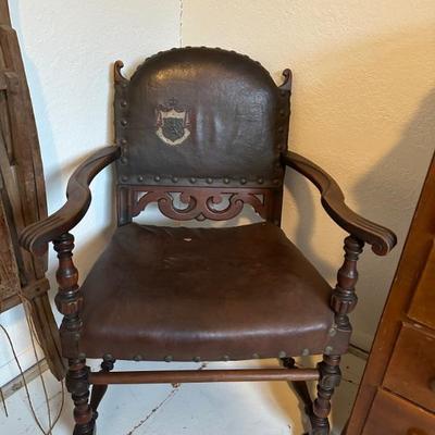 Embossed and painted leather chair