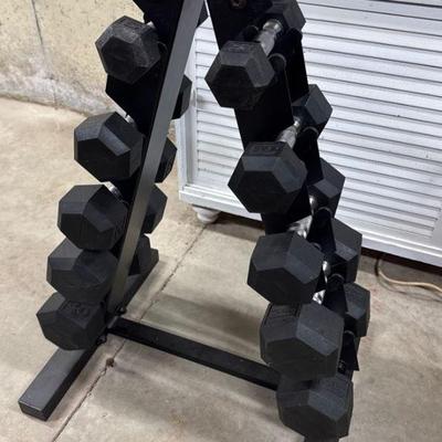 Set Of Weights On Tiered Stand
