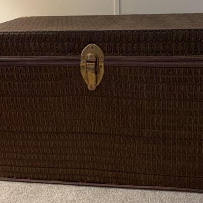 vintage wood trunk with rattan covering.