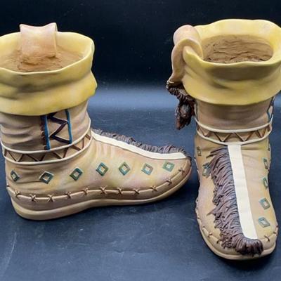 Pair of Native American moccasins planters made with resin material.
