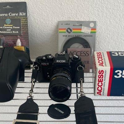 Ricoh KR-5 Super 35mm Camera With Access Lens, Case, And Assorted Acessories