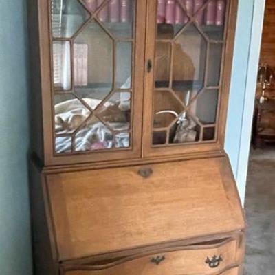 Lockable secretary with ornate glass doors