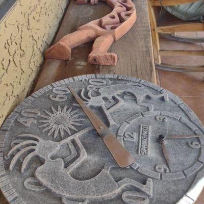 Terra cotta kokopelli wall art stone clock