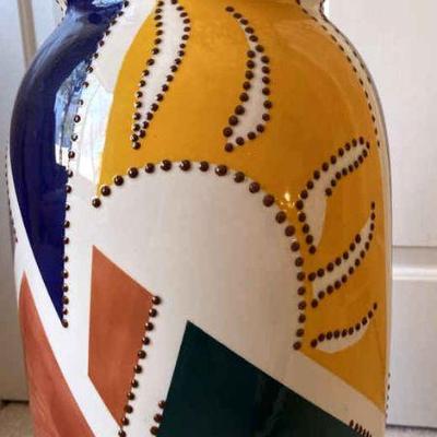 Colorful tall sun motif ceramic vase