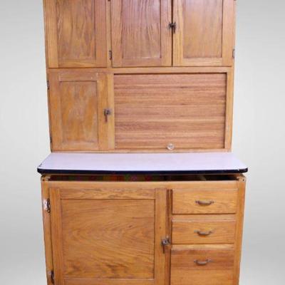 Antique Hoosier cabinet with enamel counter top